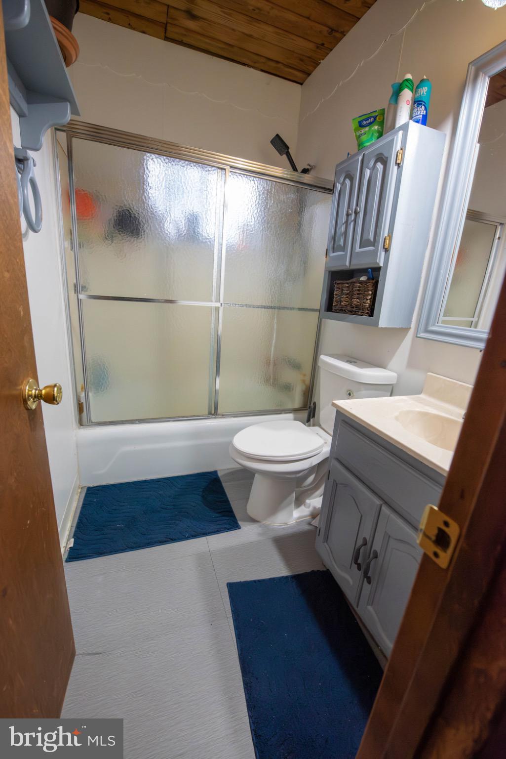117 Swallow Circle Bushkill, PA 18324 - Photo 24 of 47 a bathroom with a sink and a mirror