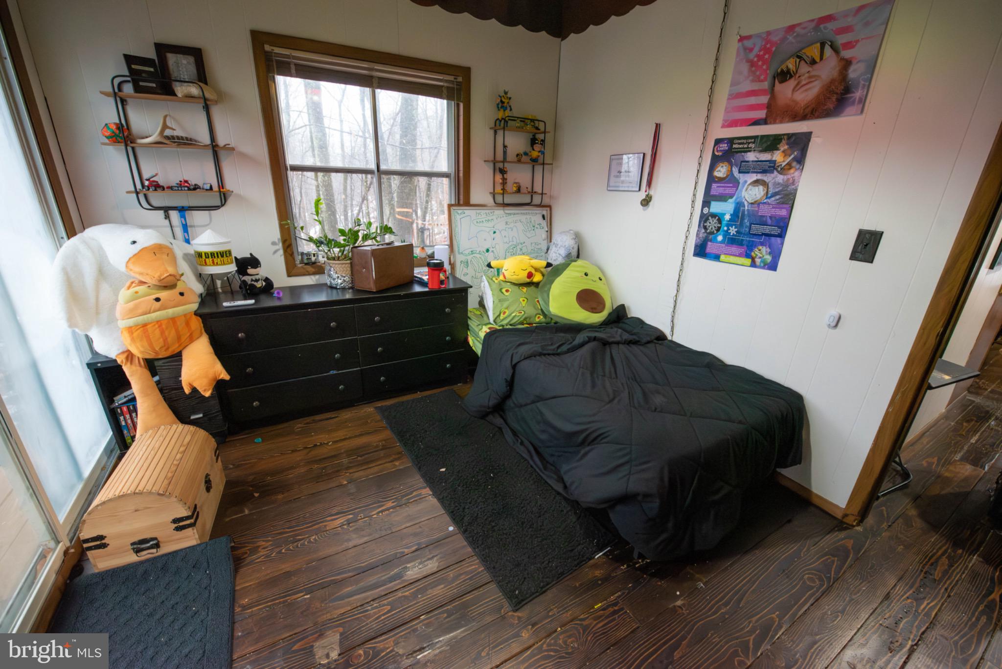 117 Swallow Circle Bushkill, PA 18324 - Photo 26 of 47 a living room with furniture and a window