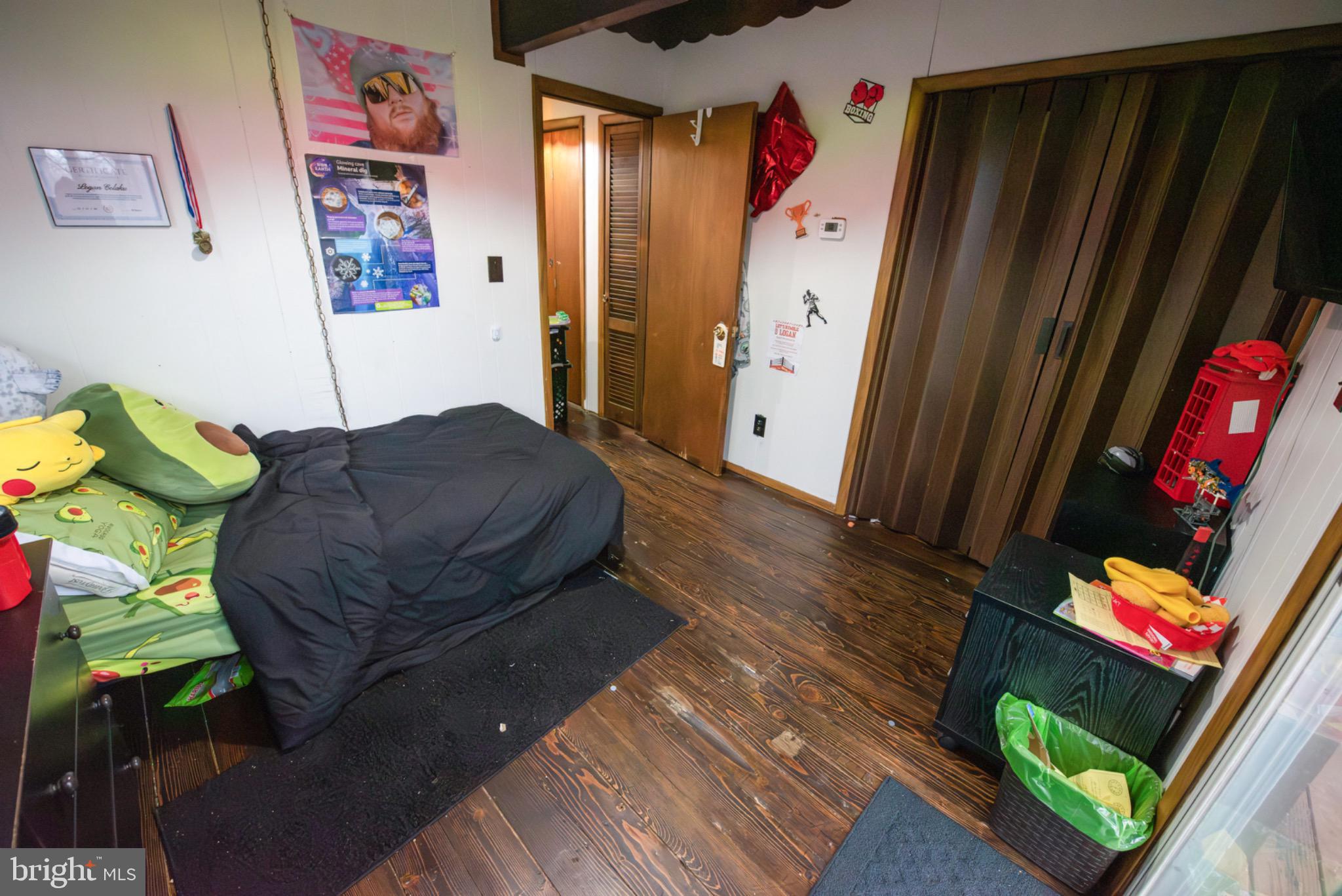 117 Swallow Circle Bushkill, PA 18324 - Photo 27 of 47 a bedroom with a bed and a window