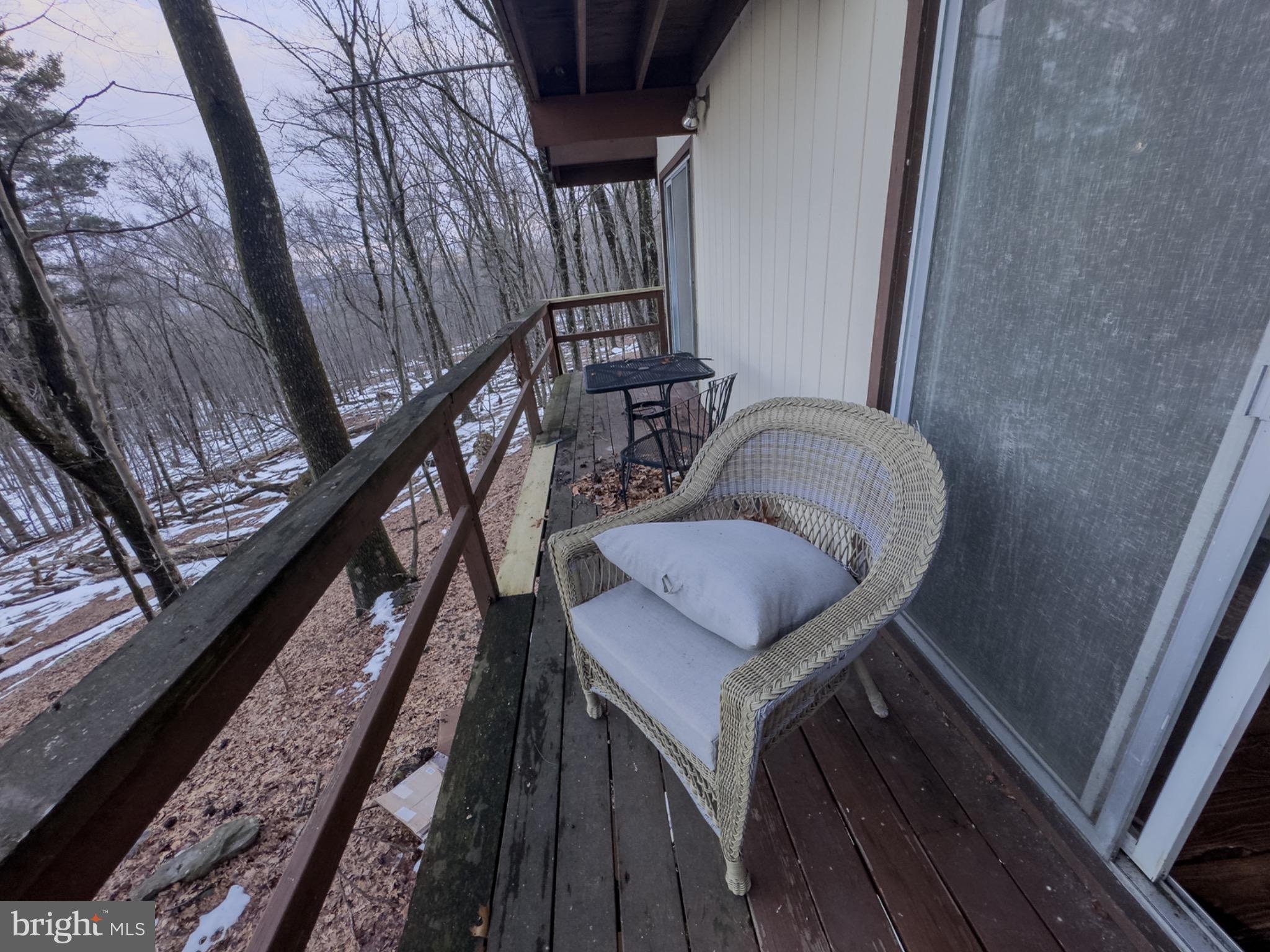 117 Swallow Circle Bushkill, PA 18324 - Photo 30 of 47 a balcony with wooden floor