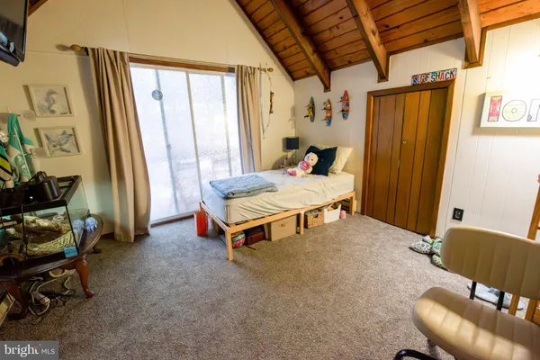 a room with table and chairs