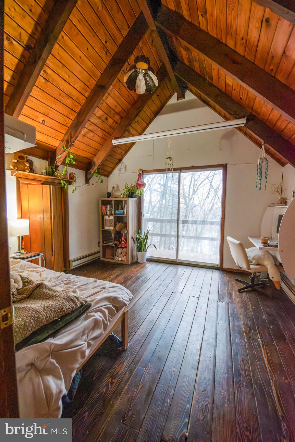 117 Swallow Circle Bushkill, PA 18324 - Photo 39 of 47 a view of a room with wooden floor