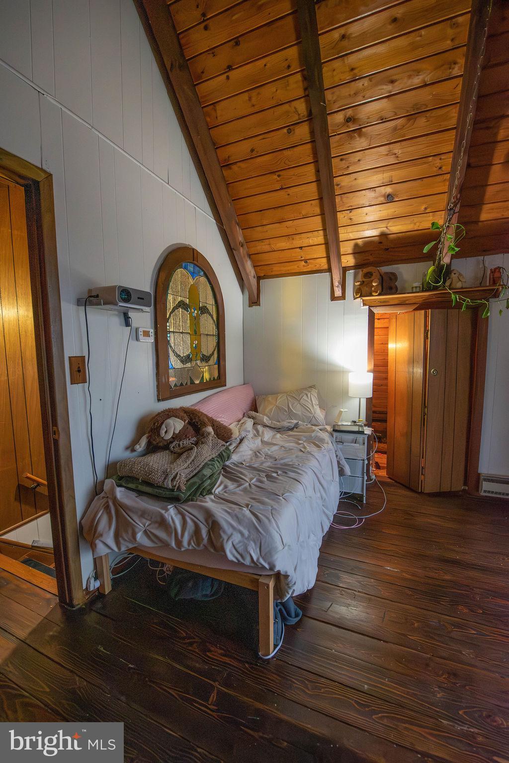 117 Swallow Circle Bushkill, PA 18324 - Photo 40 of 47 a bedroom with a bed and a mirror