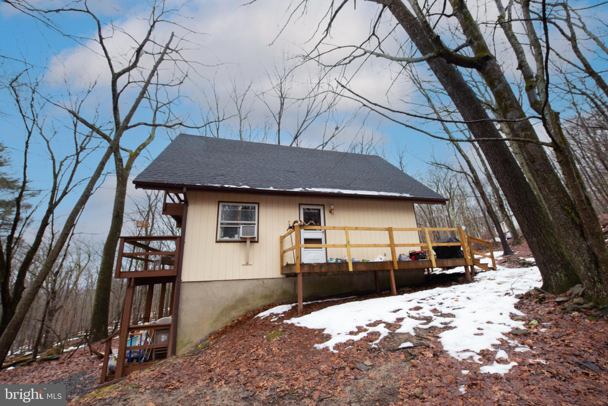 117 Swallow Circle Bushkill, PA 18324 - Photo 4 of 47 a view of a house with a snow in the yard