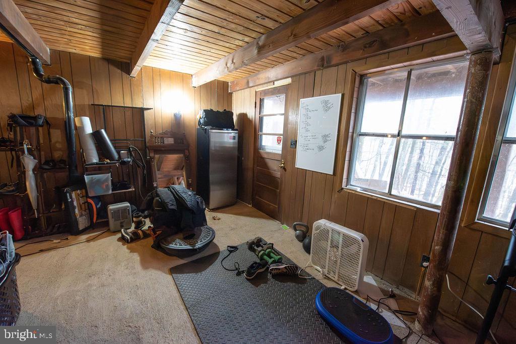 117 Swallow Circle Bushkill, PA 18324 - Photo 46 of 47 a room with gym equipment and a large window