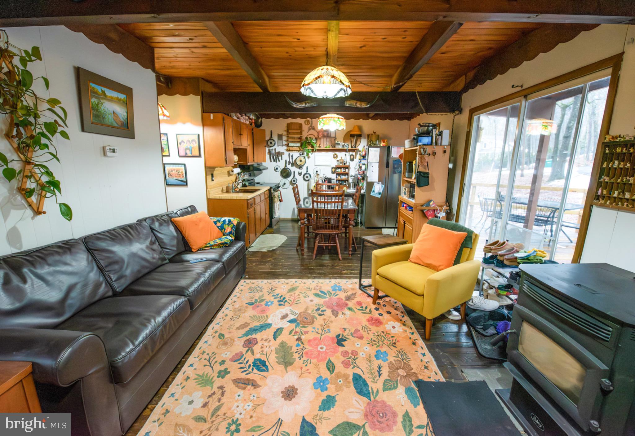 117 Swallow Circle Bushkill, PA 18324 - Photo 10 of 47 a living room with furniture and a large window