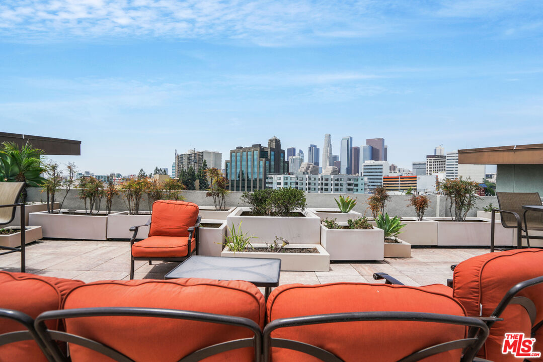 100 South Alameda Street, Unit 308 Los Angeles, CA 90012 - Photo 21 of 30 a outdoor space with patio fireplace