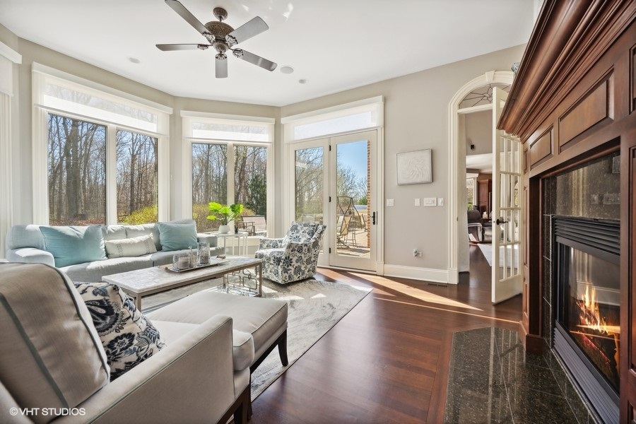 627 Alberosky Way Batavia, IL 60510 - Photo 12 of 73 a living room with furniture large window and wooden floor