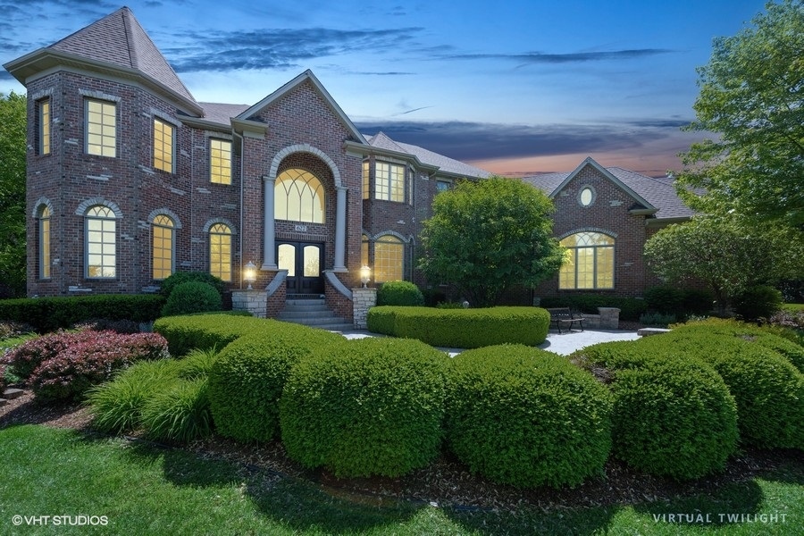 627 Alberosky Way Batavia, IL 60510 - Photo 3 of 73 a front view of a house with garden