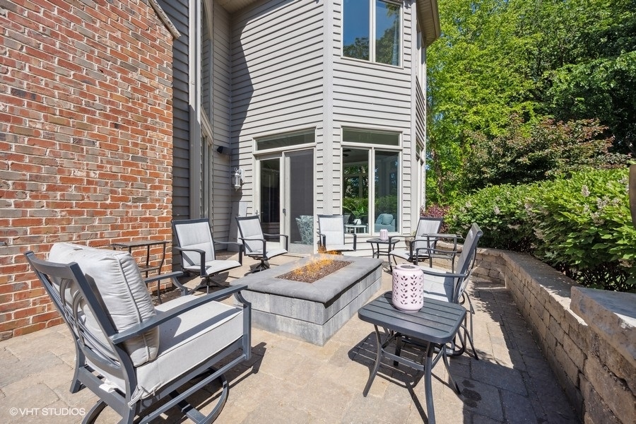 627 Alberosky Way Batavia, IL 60510 - Photo 44 of 73 a view of a patio with chairs and tables back yard