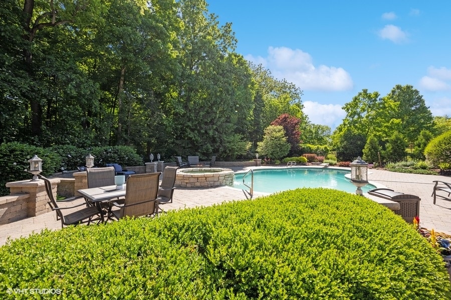 627 Alberosky Way Batavia, IL 60510 - Photo 47 of 73 a view of a swimming pool with seating space