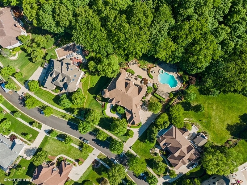 627 Alberosky Way Batavia, IL 60510 - Photo 51 of 73 an aerial view of residential house with outdoor space and trees all around