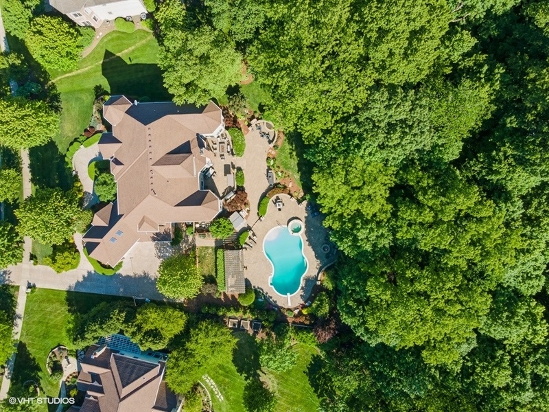 627 Alberosky Way Batavia, IL 60510 - Photo 53 of 73 an aerial view of a house with a yard and swimming pool