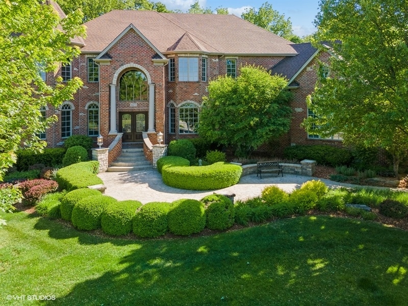 627 Alberosky Way Batavia, IL 60510 - Photo 65 of 73 a front view of a house with a yard