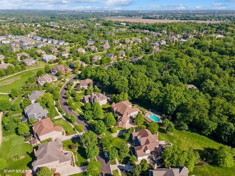 627 Alberosky Way Batavia, IL 60510 - Photo 68 of 73 an aerial view of residential houses with outdoor space and trees