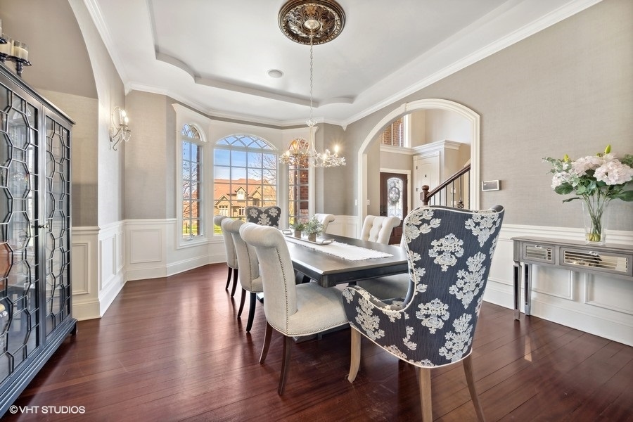 627 Alberosky Way Batavia, IL 60510 - Photo 9 of 73 a view of a dining room with furniture window and wooden floor