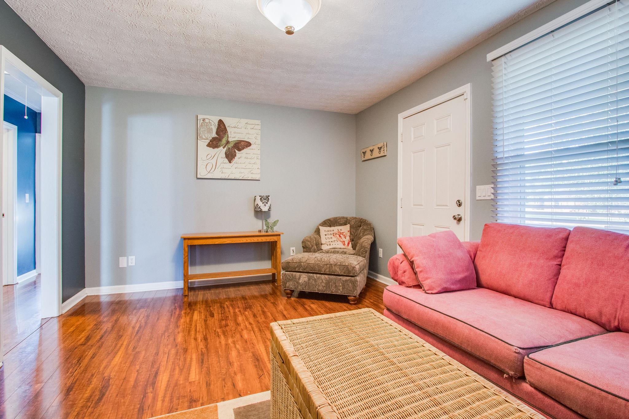 580 Curd Road Mount Juliet, TN 37122 - Photo 5 of 17 a bedroom with furniture and a wooden floor