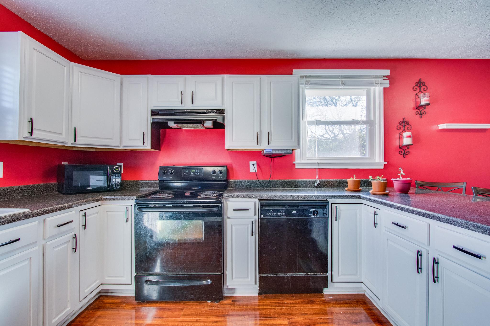 580 Curd Road Mount Juliet, TN 37122 - Photo 10 of 17 a kitchen with stainless steel appliances granite countertop a stove and cabinets
