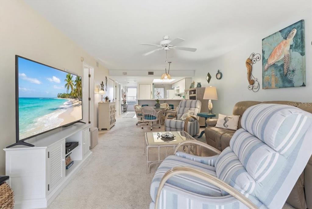 6800 Placida Road, Unit 192 Englewood, FL 34224 - Photo 13 of 33 a living room with furniture and a flat screen tv
