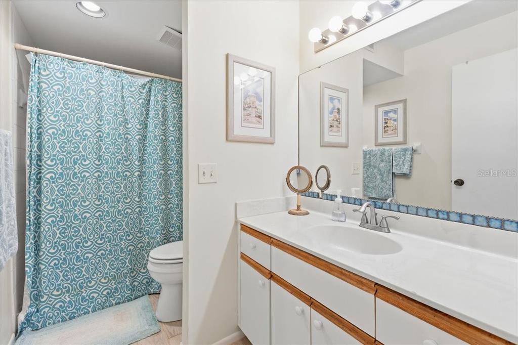 6800 Placida Road, Unit 192 Englewood, FL 34224 - Photo 18 of 33 a bathroom with a sink toilet and shower