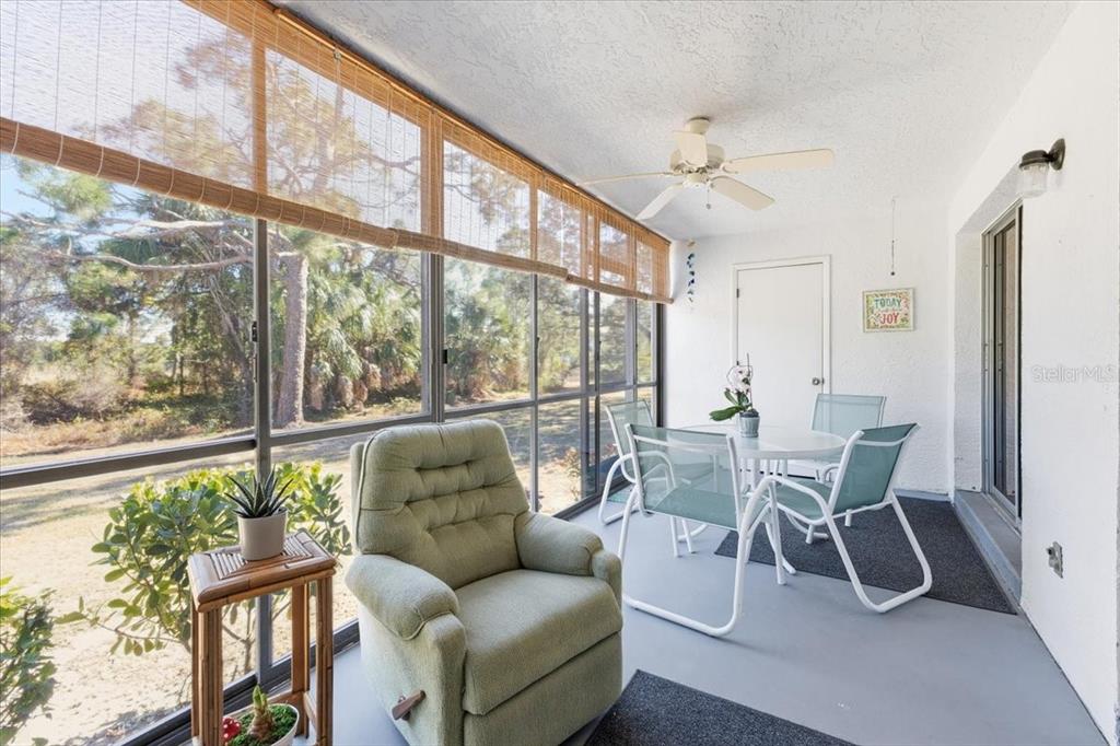 6800 Placida Road, Unit 192 Englewood, FL 34224 - Photo 22 of 33 a dining room with furniture window and outside view