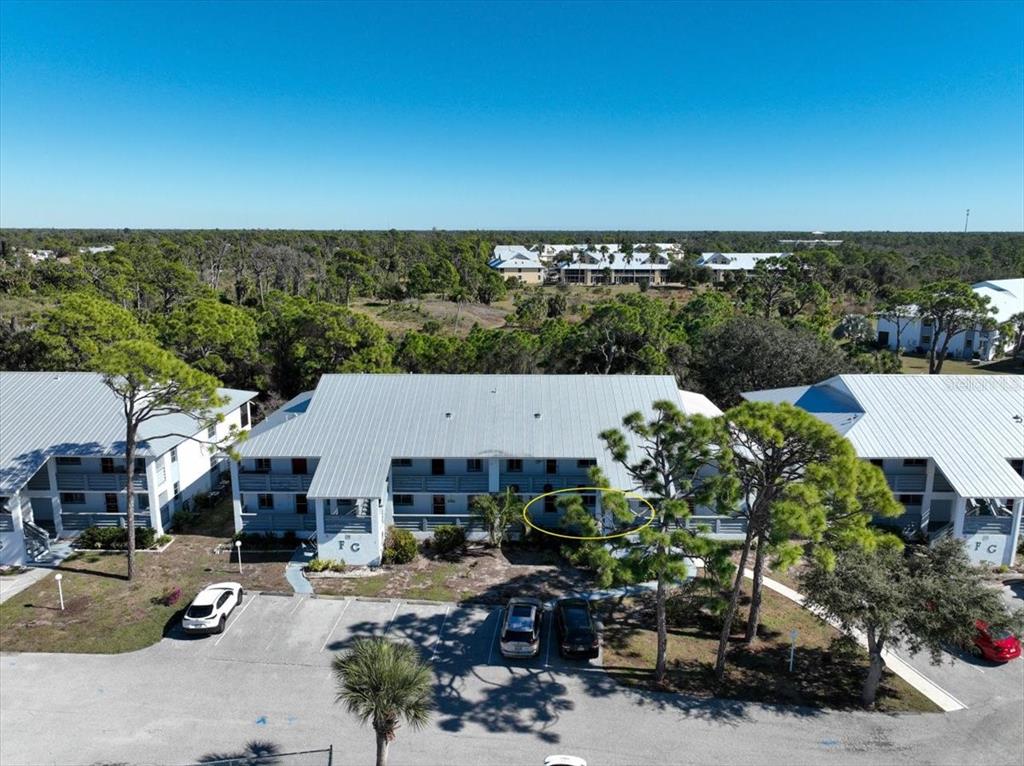 6800 Placida Road, Unit 192 Englewood, FL 34224 - Photo 26 of 33 an aerial view of a house with sitting space and garden view