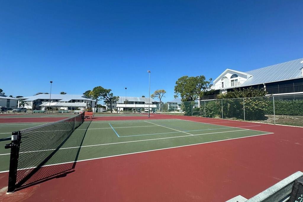 6800 Placida Road, Unit 192 Englewood, FL 34224 - Photo 30 of 33 a view of a tennis court