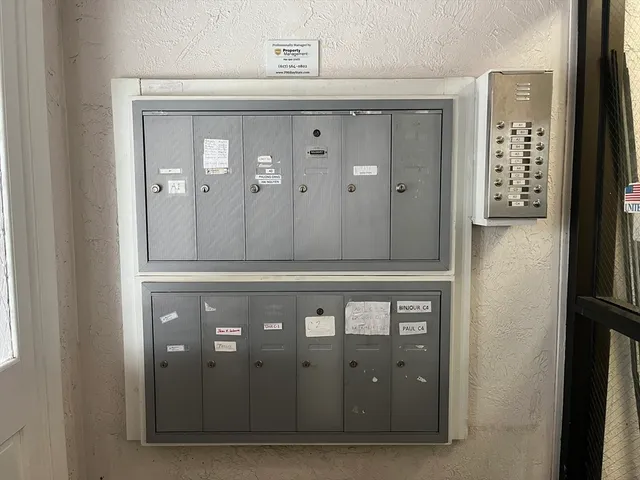 a view of street with parked cars