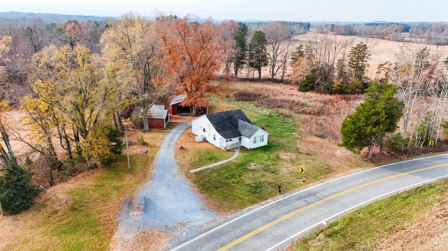 1089 Straightstone Road Gretna, VA 24557 - Photo 2 of 26 a view of a yard with large trees