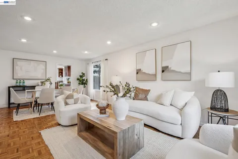 a living room with furniture and a couch