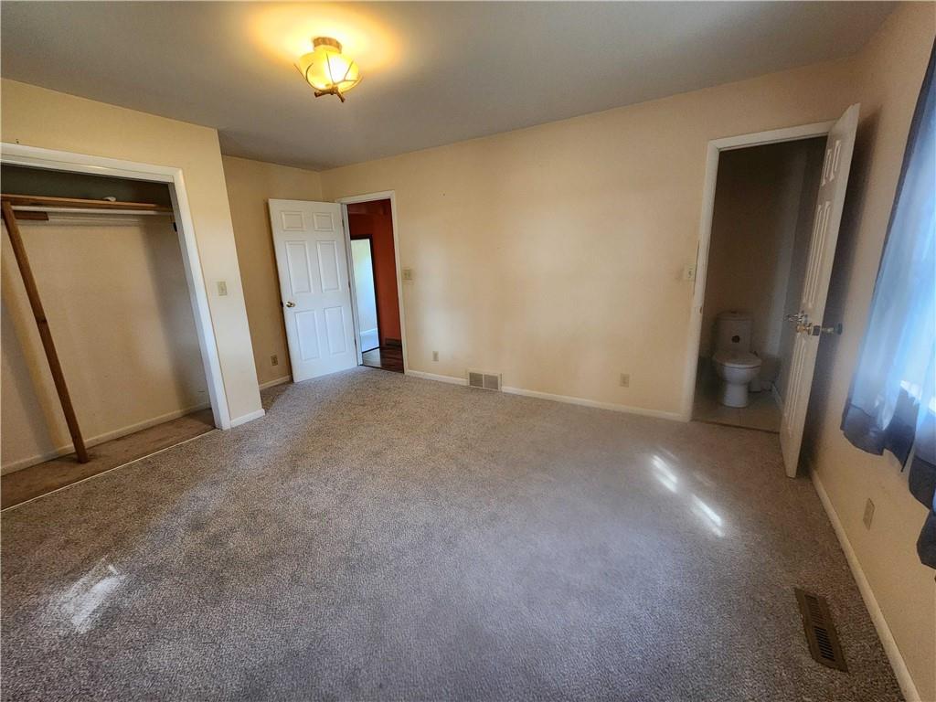 2340 Mercer West Middlesex Road West Middlesex, PA 16159 - Photo 24 of 36 an empty room with closet and mirror