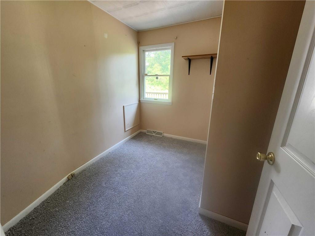 2340 Mercer West Middlesex Road West Middlesex, PA 16159 - Photo 25 of 36 a view of a small space with wooden floor and a window