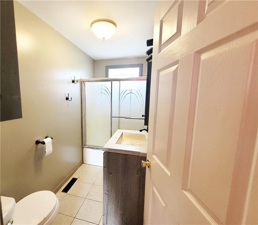 2340 Mercer West Middlesex Road West Middlesex, PA 16159 - Photo 28 of 36 a bathroom with a sink toilet and shower