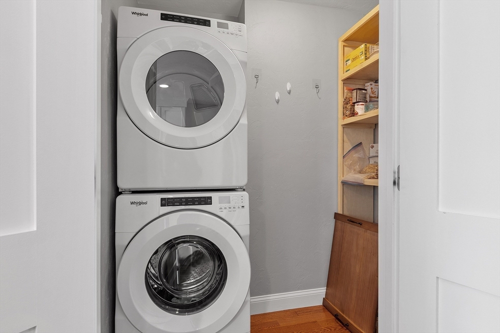 4 Scotch Pine Farm Way, Unit 1 Pepperell, MA 01463 - Photo 15 of 35 a utility room with dryer and washer