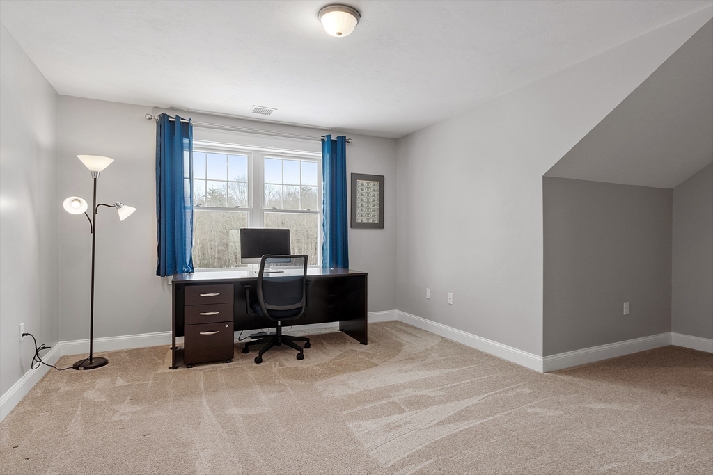 4 Scotch Pine Farm Way, Unit 1 Pepperell, MA 01463 - Photo 24 of 35 a workspace with furniture and window