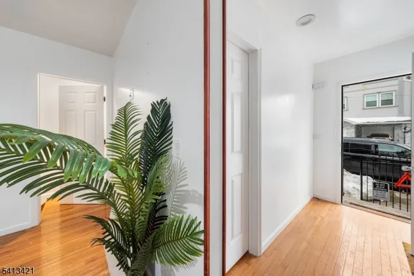 a view of a bedroom with a bed and a couch