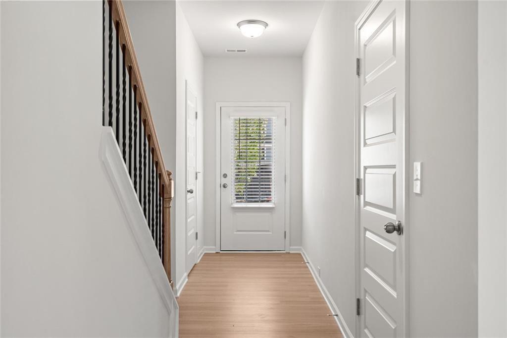 169 Andros Loop Dalton, GA 30721 - Photo 4 of 38 a view of a hallway with windows