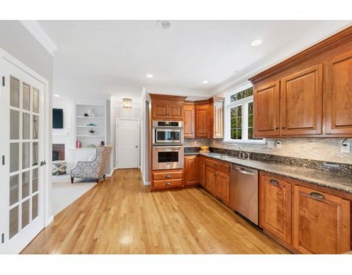 866 Marston Road Northbridge, MA 01588 - Photo 9 of 29 a large kitchen with stainless steel appliances