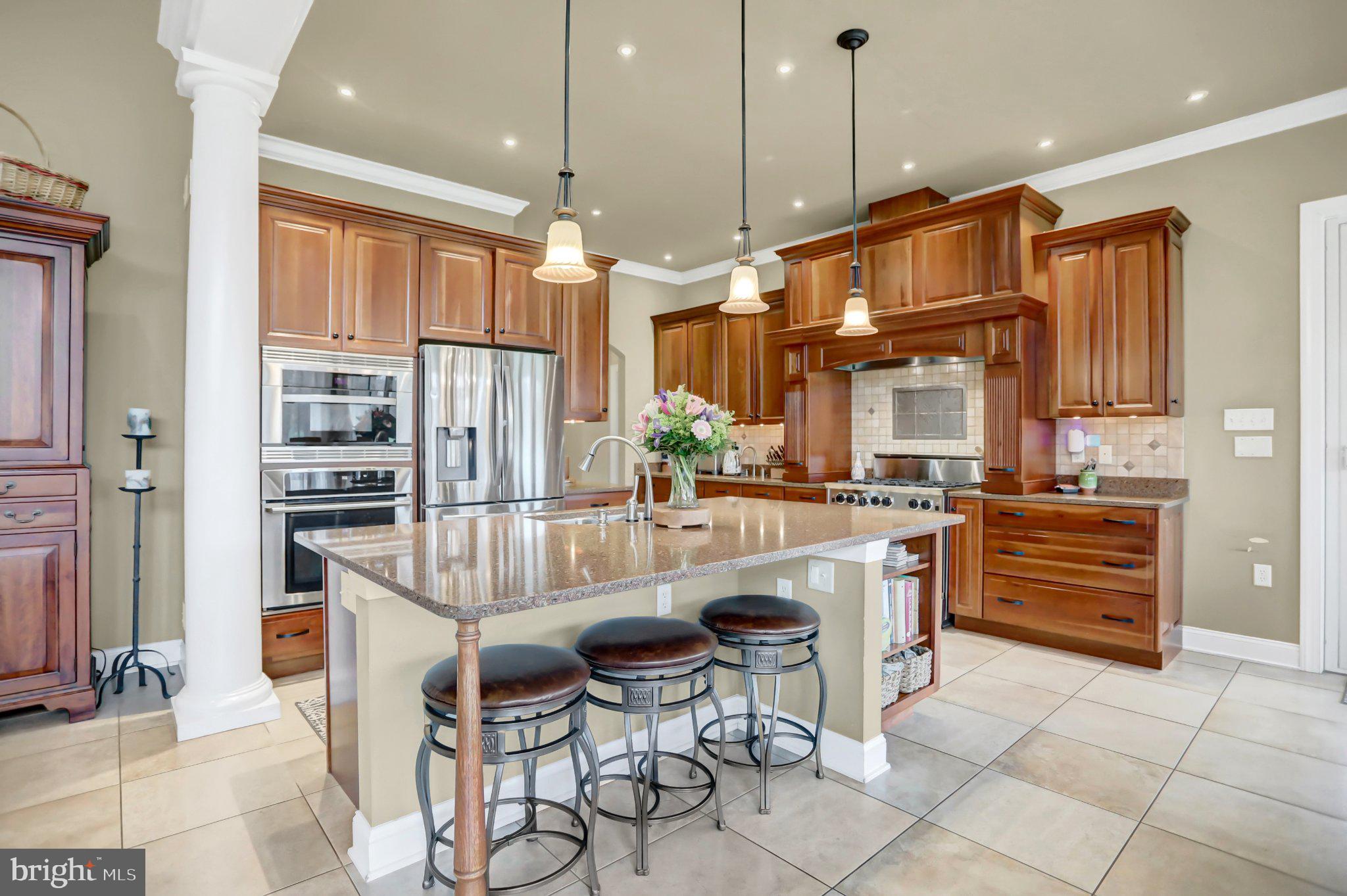 970 App Road Selinsgrove, PA 17870 - Photo 26 of 76 Elegant kitchen with rich wood tones.