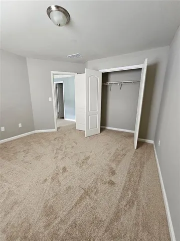 a bathroom with a sink a mirror and vanity