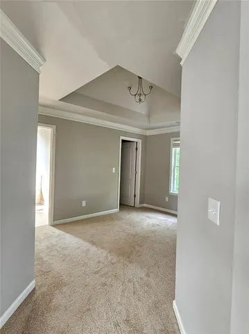 a view of living room with furniture and a wooden floor