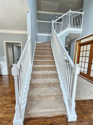 a view of entryway with wooden floor