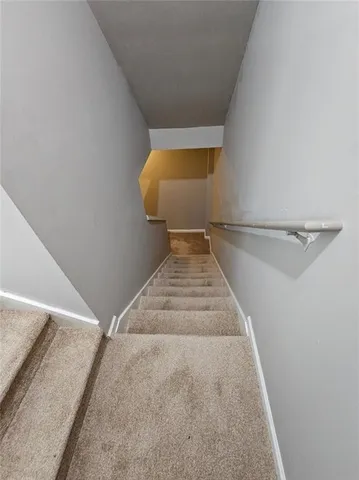 a bathroom with a shower and a shower