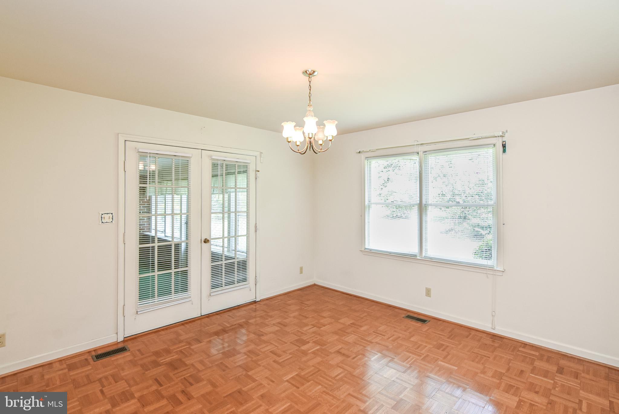 455 Courthouse Road Stafford, VA 22554 - Photo 12 of 62 DIning Room. Enclosed porch to left, view to back.