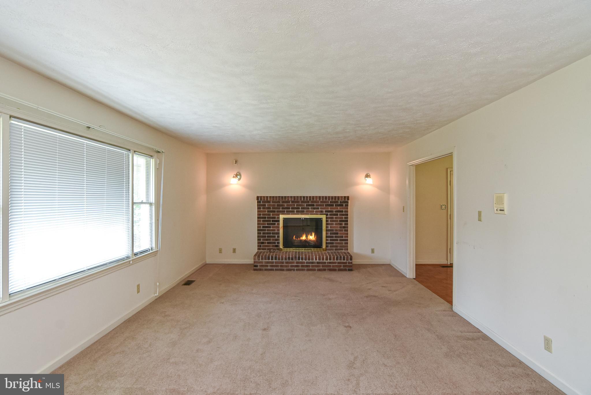 455 Courthouse Road Stafford, VA 22554 - Photo 3 of 62 Living room. Dining room to the right.