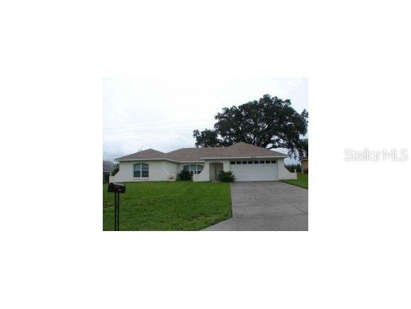 2605 Southwest 145th Place Road Ocala, FL 34473 - Photo 1 of 1 a black and white photo of a house
