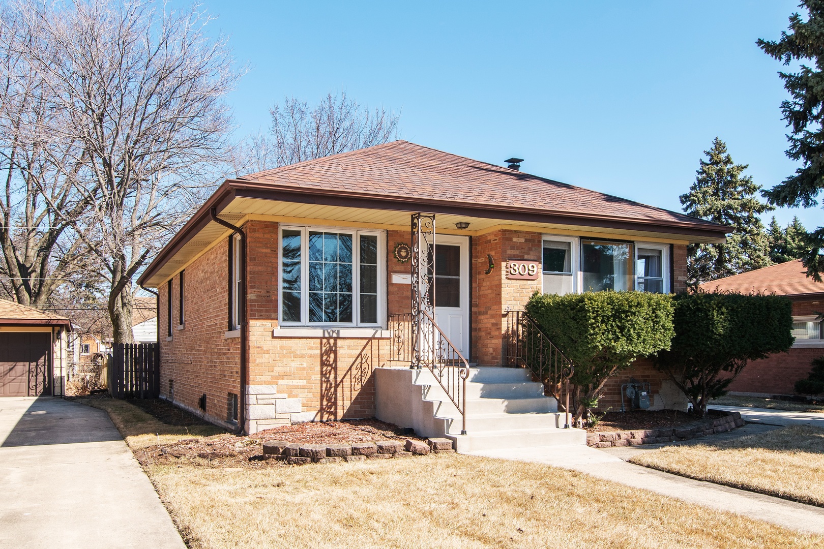 309 High Ridge Road Hillside, IL 60162 - Photo 1 of 13 a front view of a house with a yard