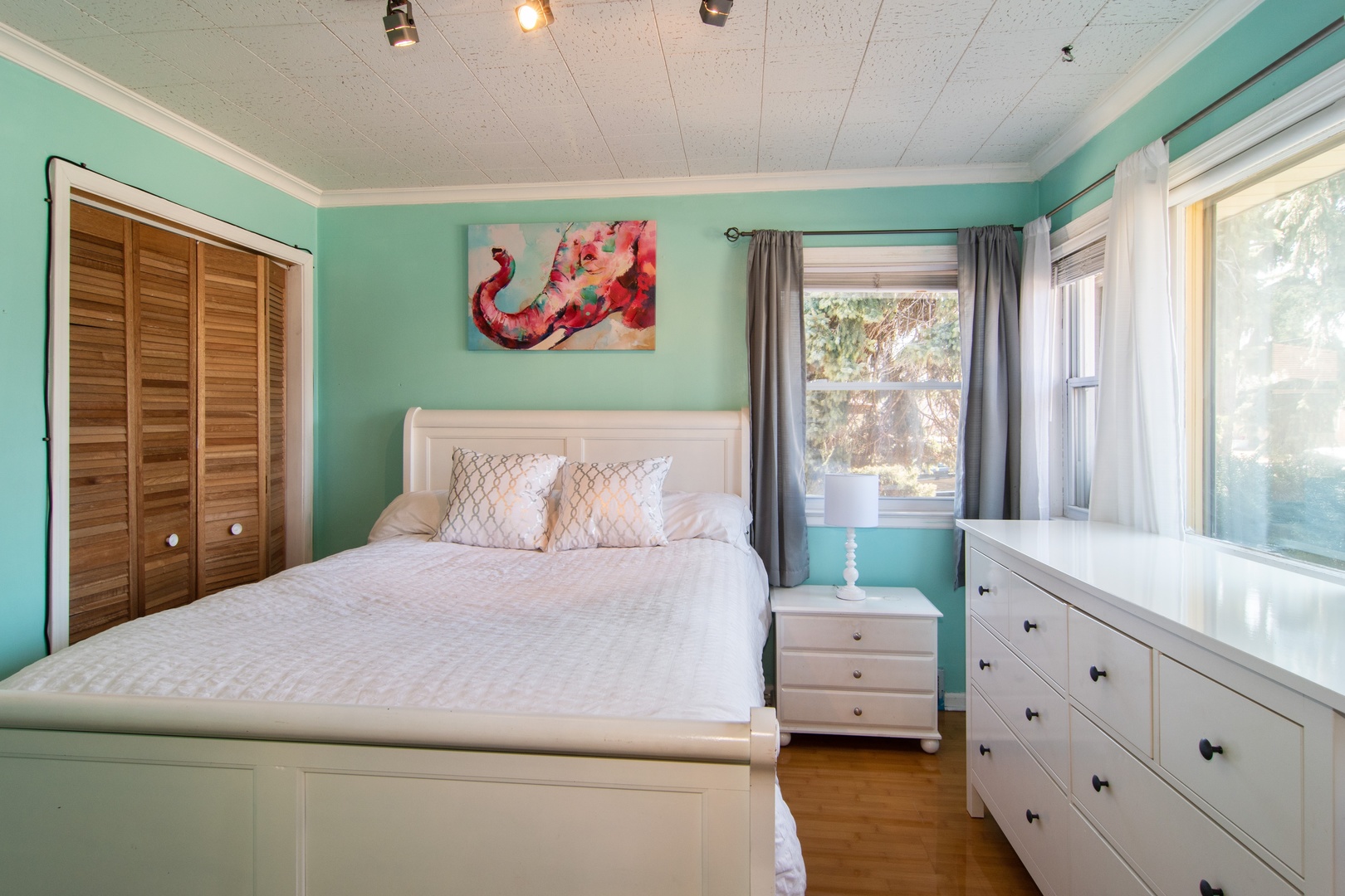 309 High Ridge Road Hillside, IL 60162 - Photo 6 of 13 a bedroom with a bed dresser and a window