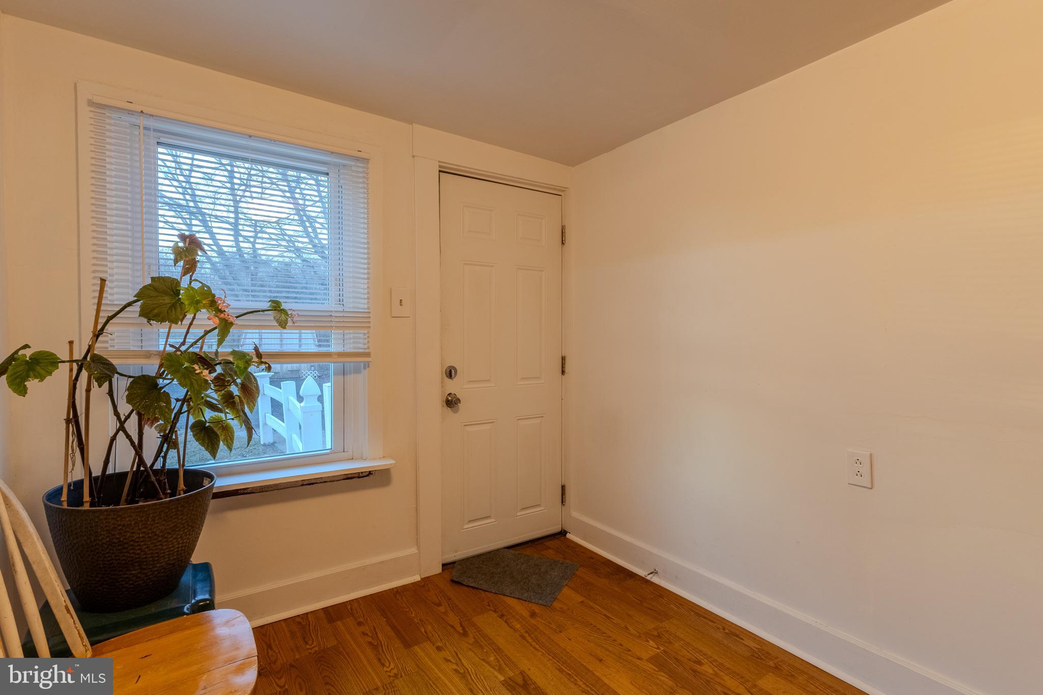 1168 Mt Zion Marlboro Road Lothian, MD 20711 - Photo 13 of 26 a view of a room with wooden floor and a window