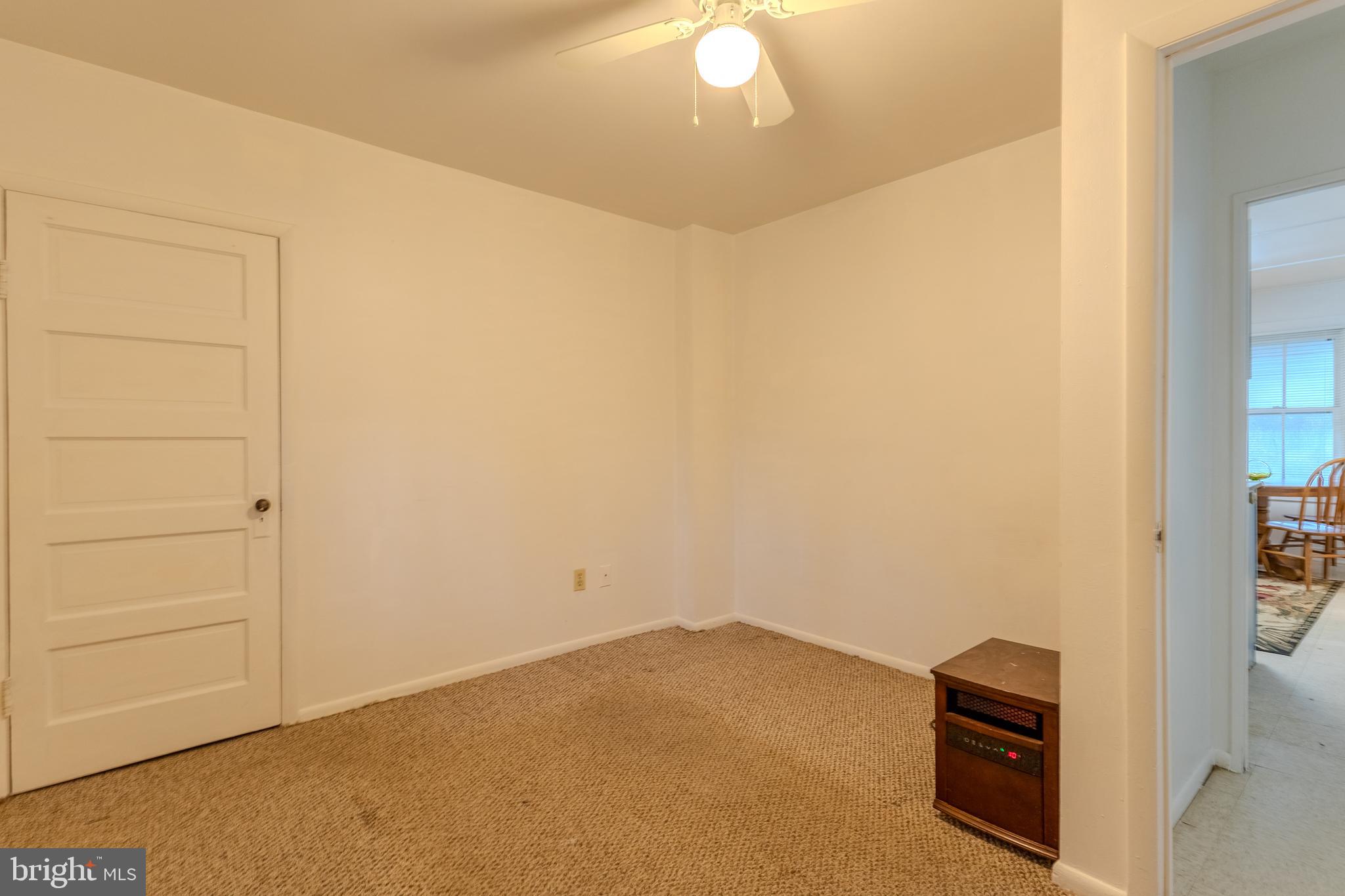 1168 Mt Zion Marlboro Road Lothian, MD 20711 - Photo 18 of 26 an empty room with a empty space
